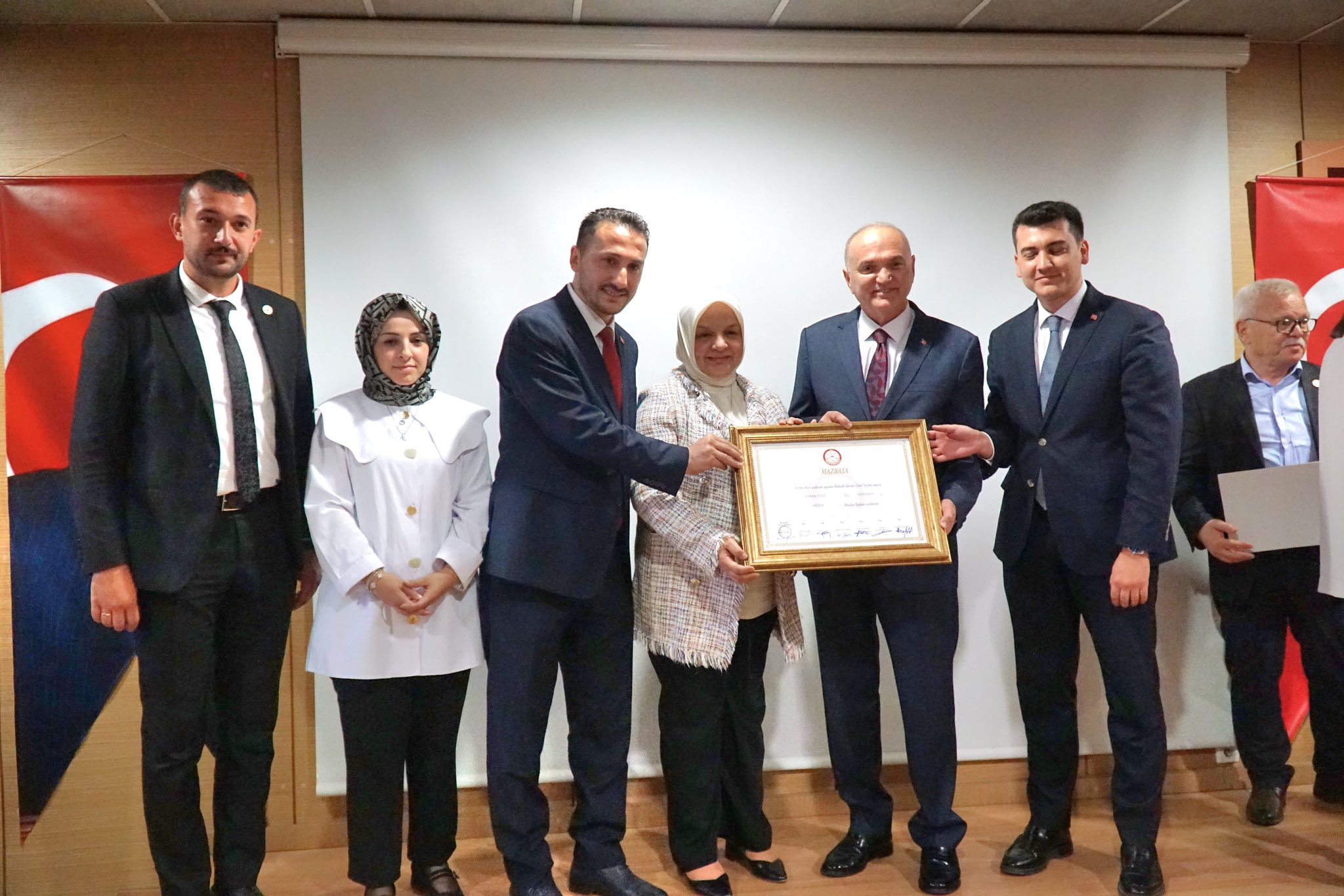 BAŞKAN ÖZLÜ MAZBATASINI ALDI